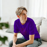 Young man seated wearing purple affirmation crewneck t-shirt with script print, Le Van Kamp Studio