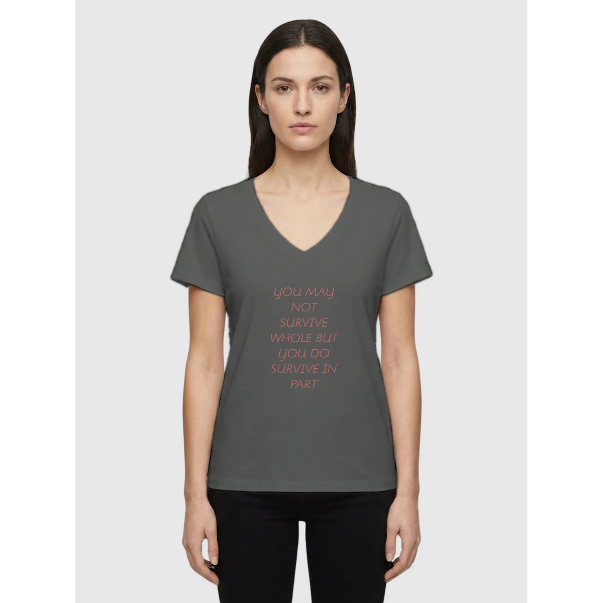 Woman wearing grey melange V-neck affirmation T-shirt with text You May Not Survive Whole But You Do Survive In Part, Le Van Kamp Studio