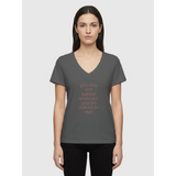 Woman wearing grey melange V-neck affirmation T-shirt with text You May Not Survive Whole But You Do Survive In Part, Le Van Kamp Studio