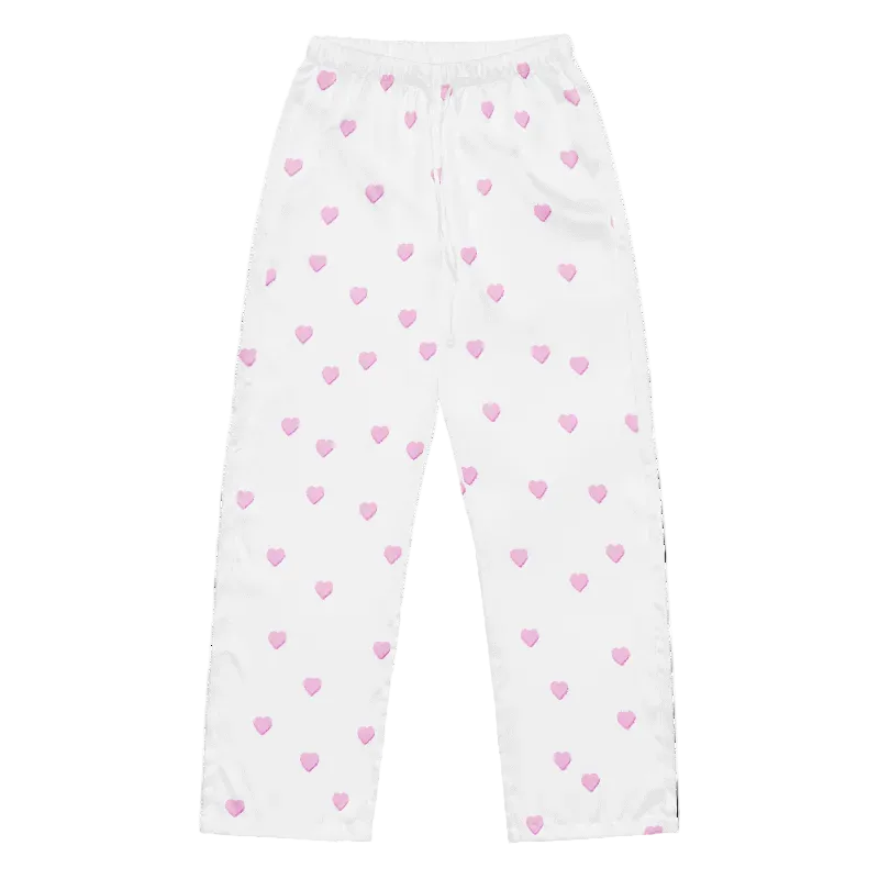 White pants with pink heart patterns on a white background