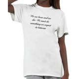Woman wearing a white T-shirt with black script reading “We are born and we die. We must do something we respect in between.”