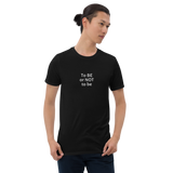 To Be or Not to Be ACTOR unisex tee dark heather on model front — Le Van Kamp Studio