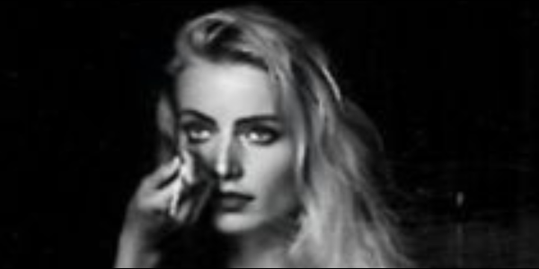 Actress Merete Van Kamp photographed by Peter Beard — behind the scenes, make-up being applied on set