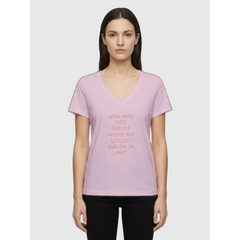 Woman wearing grey melange V-neck affirmation T-shirt with text You May Not Survive Whole But You Do Survive In Part, Le Van Kamp Studio