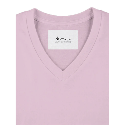 Detail view of women's candy pink short sleeve V-neck affirmation T-shirt, Behave Beautifully series by Le Van Kamp Studio