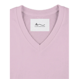 Detail view of women's candy pink short sleeve V-neck affirmation T-shirt, Behave Beautifully series by Le Van Kamp Studio
